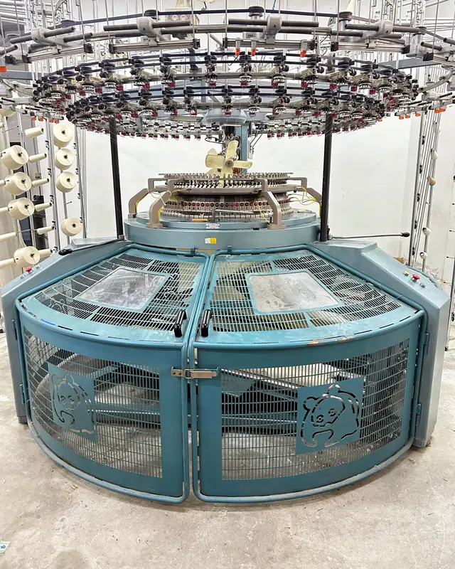 Circular knitting machine used for knitted fabric production in Portugal